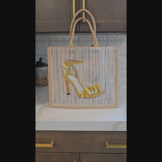 Video with close ups of Dana’s Uncommon Glass Golden Butterfly Stiletto Jute Tote — hand-painted fashion bag with butterfly accents