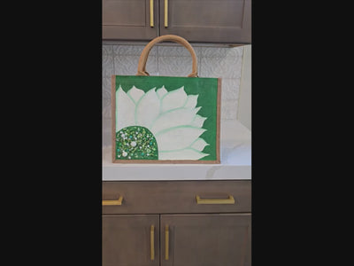 Video of green sunflower tote bag, jute sunflower bag, eco-friendly floral market bag, hand painted sunflower tote