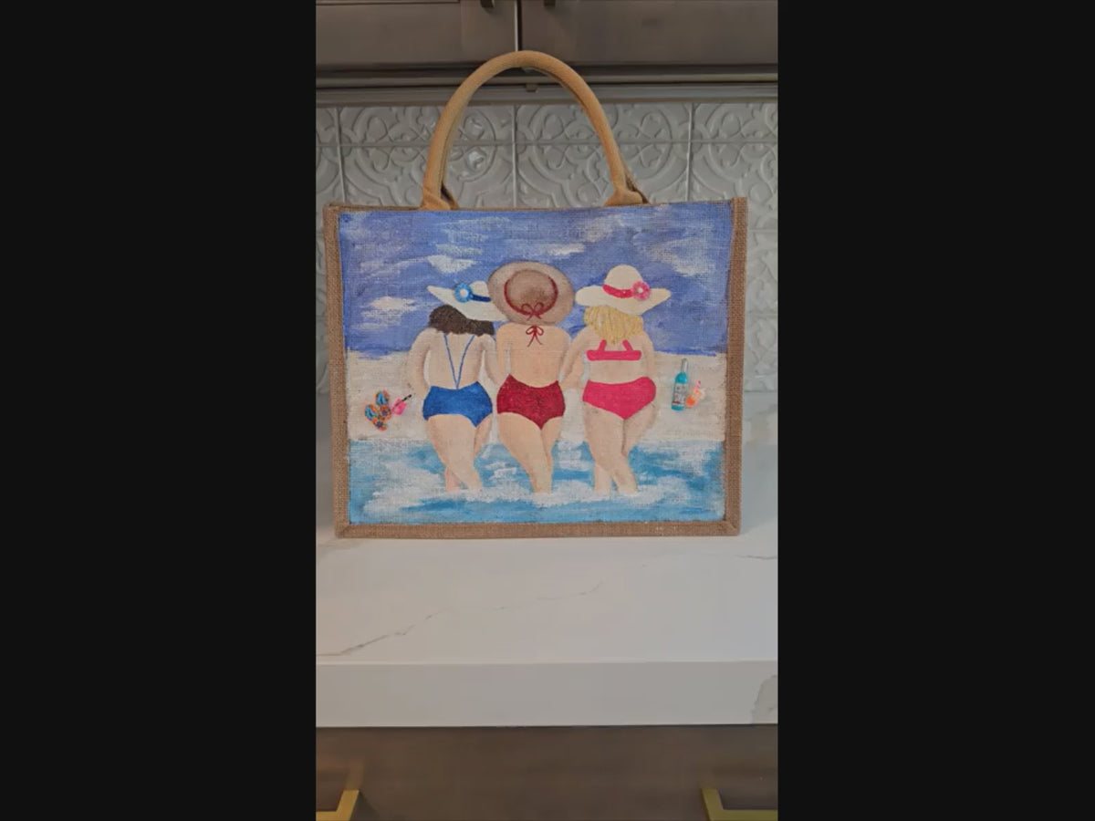 video of girlfriends beach tote bag, blue tote bag, hand painted beaded beach jute bag, eco-friendly beach tote, friends at the beach tote