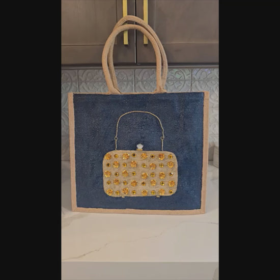 video ofHand-painted navy jute purse tote with gold flower and jewel embellishments 