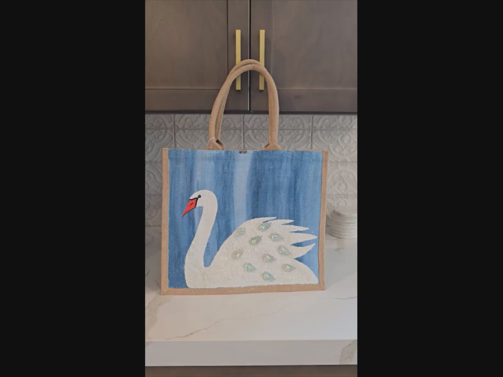 Video of Hand Painted and embellished white swan tote bag by Dana's Uncommon Glass 