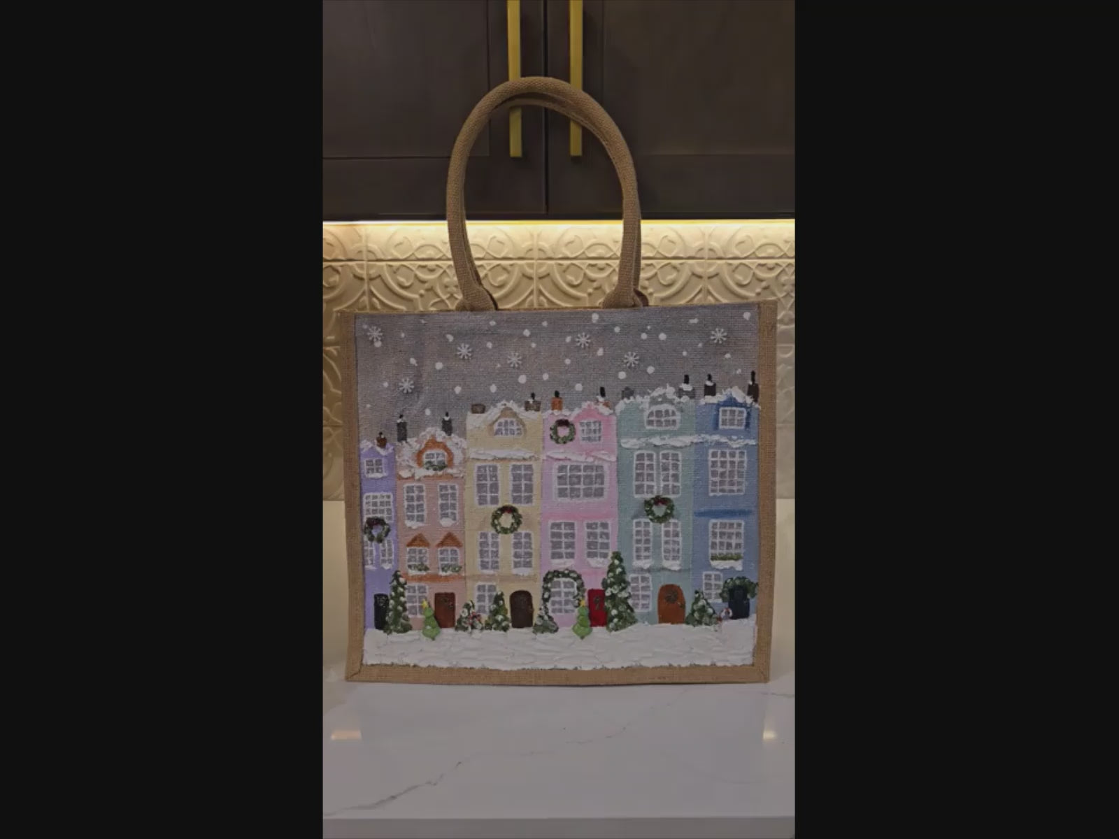 Hand-painted pastel gingerbread row houses in the snow on jute tote, Holiday village street artwork on artisan lined tote, Pastel Christmas houses tote with wreaths and snowfall