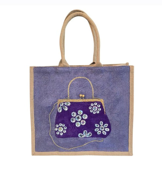 Hand-painted lavender jute tote bag featuring an embellished purple vintage-style purse design with sparkling jewel accents and dimensional floral details. Elegant fashion-inspired statement tote with natural jute trim, double handles, and magnetic snap closure. Perfect for boutique fashion lovers, dressy occasions, and unique handmade gift giving.