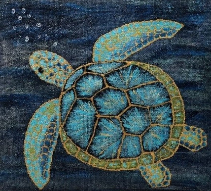 Close up of Hand-painted jute tote bag featuring a blue and turquoise sea turtle swimming underwater against a deep navy ocean background, with natural burlap handles and trim.