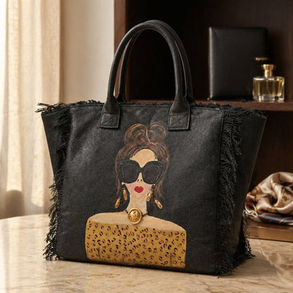 Hand-painted black fringed tote bag with glam sunglasses woman design and leopard print detail