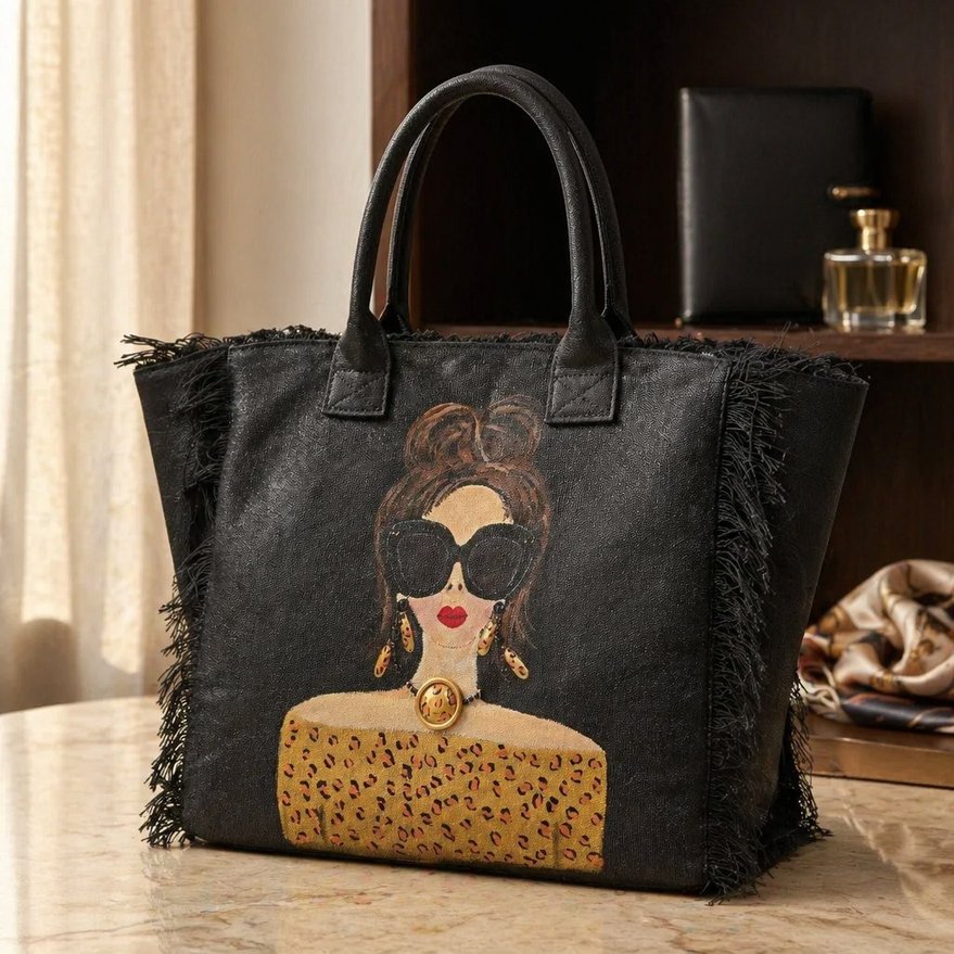 Hand-painted black fringed tote bag with glam sunglasses woman design and leopard print detail